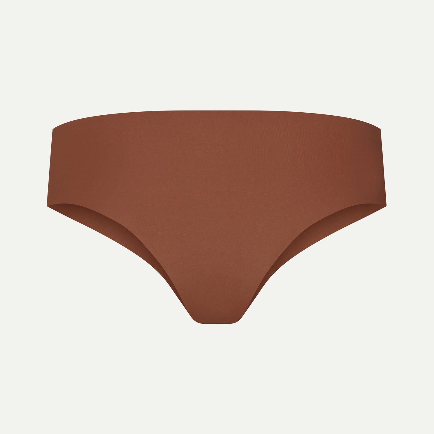 Back view of brown camel toe proof thong with wide, seamless back that stays in place — no wedgies, no digging in, just smooth invisible fit under leggings.