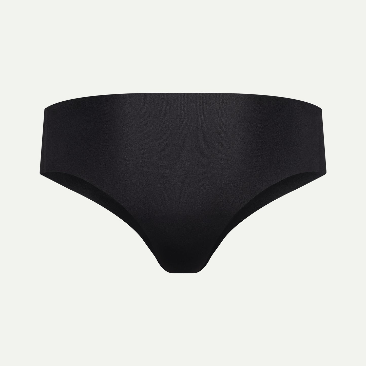Back view of black camel toe proof thong featuring a wide, seamless back that prevents wedgies and digging in — ideal for comfort and invisible wear under leggings.