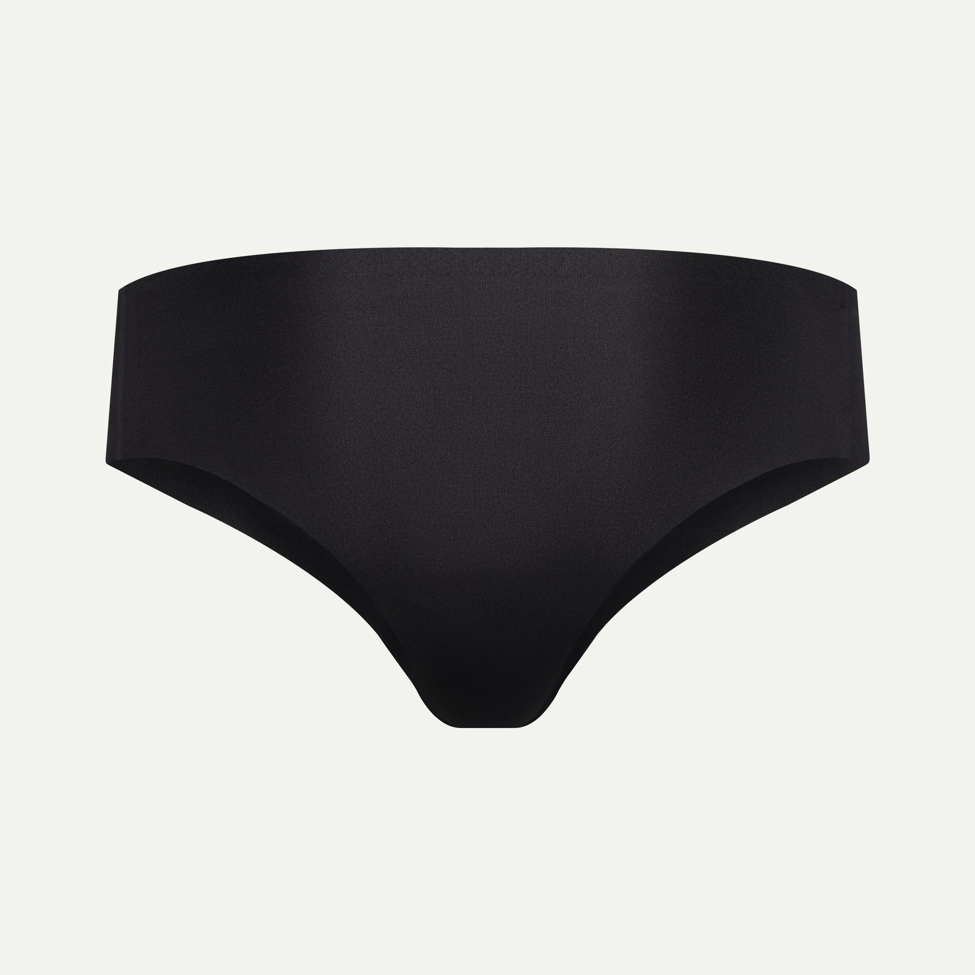Back view of black camel toe proof thong featuring a wide, seamless back that prevents wedgies and digging in — ideal for comfort and invisible wear under leggings.