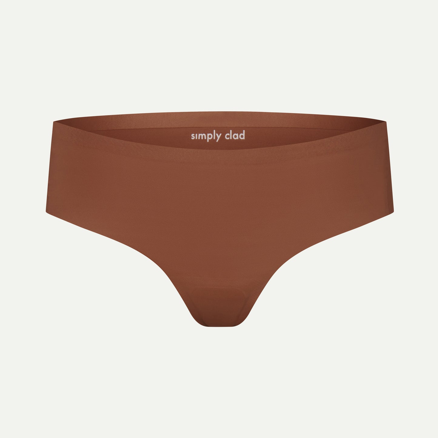 Front view of brown camel toe proof thong with no front seam and built-in concealer pad for smooth, invisible coverage under leggings and tight outfits.