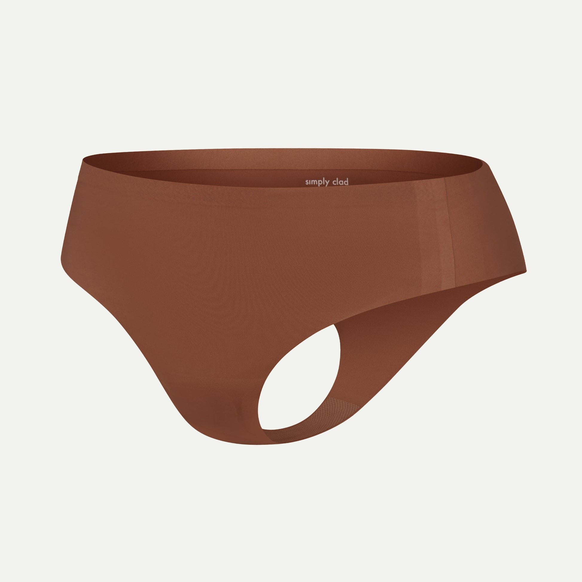 Side view of brown camel toe proof thong featuring our built-in concealer pad, seamless design, and targeted structure for ultimate camel toe coverage and all-day comfort.