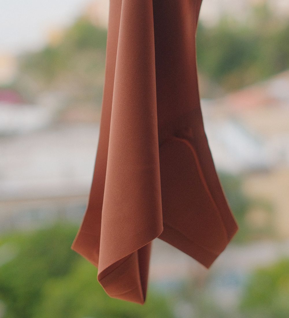 Camel toe proof thong fabric with breathable, non-toxic, hypoallergenic, seamless design and built-in gusset for invisible coverage.