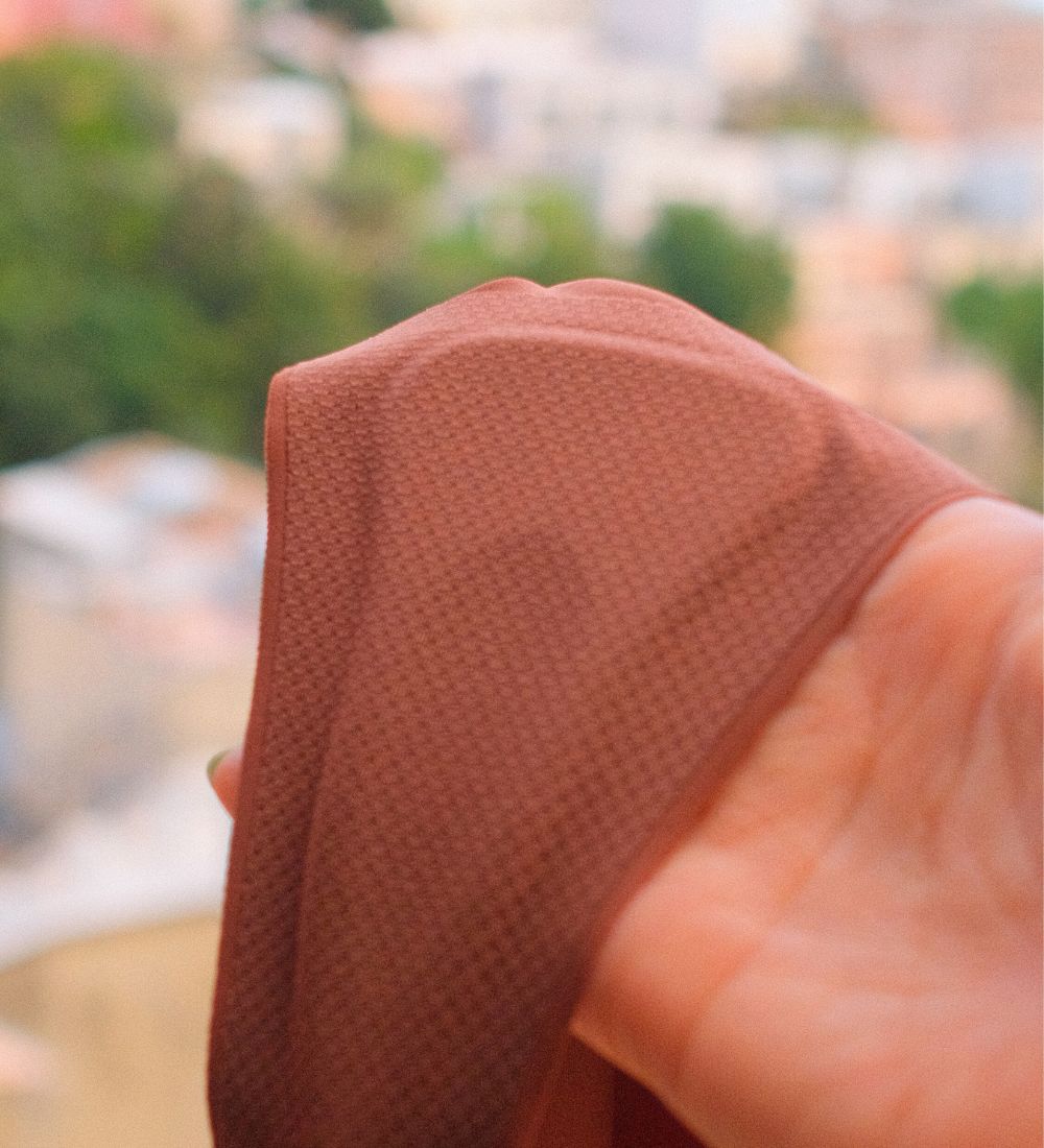 Close-up of Simply Clad's breathable, flexible, soft, globally patented pad designed for maximum camel toe coverage and seamless everyday wear.
